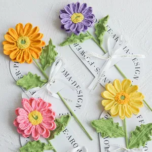 Handmade crochet gerbera bouquet with Love Is Eternal ribbon for desktop decoration
