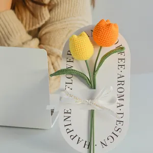 Handmade knitted tulip bouquet with yellow and orange flowers on decorative card gift set