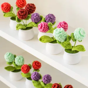 Handmade crochet pine cone potted plants in various colors for cozy home desktop decor