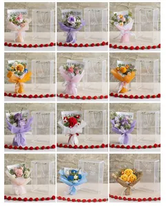 Macro view of assorted handmade crochet flower bouquets in premium gift box packaging