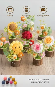 Handcrafted crochet sunflower and rose potted plants with rustic wooden bases for home decor