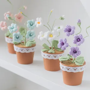 Handmade crochet freesia potted plants in pink blue white and purple with lace detail