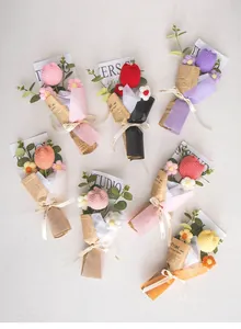 Detailed close-up of handmade crochet tulip bouquets in various pastel colors with gift wrap