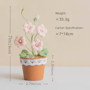 Handmade crochet freesia potted plant with pink flowers and 18cm height dimensions