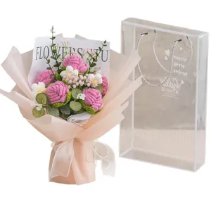 Handmade crochet rose bouquet with white daisies in pink gift wrap and clear tote bag