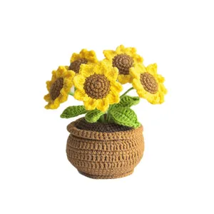Handmade crochet sunflower potted plant with five yellow blooms for home table decor
