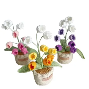 Handmade knitted lily of the valley potted plants in pink, yellow and purple hues
