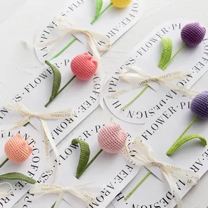 Handmade crochet tulip flower bouquet with colorful petals and silk ribbon packaging