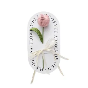 Handmade crochet pink tulip flower with Love Is Eternal ribbon for gift decoration