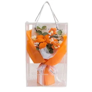 Handmade crochet orange lily bouquet in transparent gift bag with ribbon and card