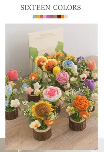 Detalle de la textura de ganchillo de tulipanes y girasoles hechos a mano en base de madera