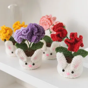 Handmade crochet carnation flowers in cute rabbit pots for home and office decor