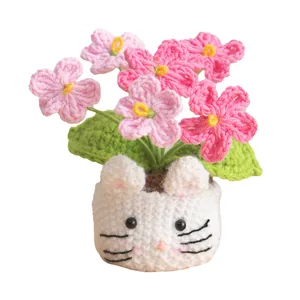 Handmade crochet pink roses in a cute white cat-shaped pot tabletop decoration