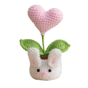 Handmade crochet pink heart potted plant with cute white bunny base for home decor
