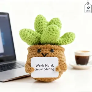 Handmade crochet succulent plant in pot with inspirational card for desk decoration
