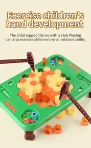 Detail view of dinosaur ice-breaking board game with hammers, plastic blocks and cute figures