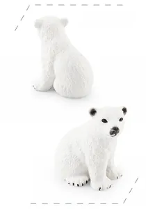 Detailed front and back views of a sitting little polar bear model with realistic fur texture