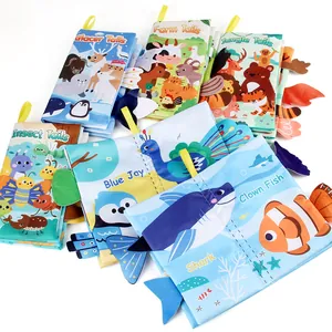 Set of baby sensory cloth books featuring 3D animal tails and high-contrast colors