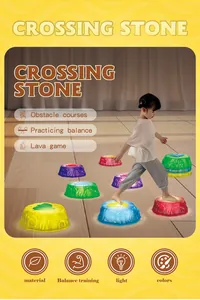Detail of colorful light-up crossing stones for kids balance and sensory training