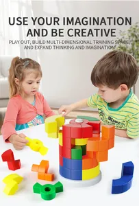 Close-up of children building colorful 3D geometric puzzles on a white table