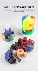 Colorful geometric building blocks set for kids with a white mesh storage bag
