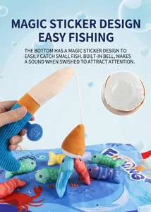 Detail view of plush toy fishing rod with Velcro hook and colorful stuffed fish with bells
