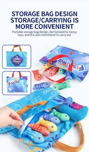 Detail view of the Little Angler plush fish set and portable blue fabric carry bag