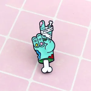 Cartoon Zombie Hand Enamel Brooch Alloy Quirky Victory Gesture Pin With White Bandage Bone Detail For Clothes Bag Backpack Accessory