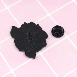 Creative cartoon rose enamel pin with textured black metallic back and butterfly clasp