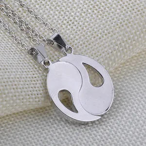 Silver Yin Yang Best Friends necklaces with interlocking Tai Chi pendants on metal chains