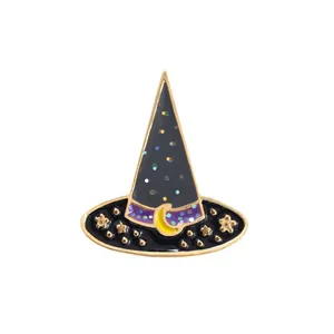 Detail of Halloween witch hat enamel brooch with gold trim and colorful polka dots