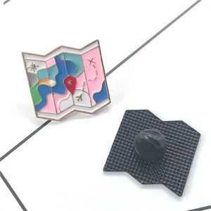 Colorful cartoon airport map enamel pin showing front and back views on white background