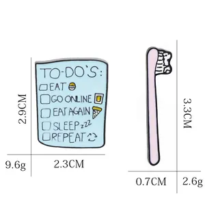 Cartoon enamel pin set with blue to-do list and pink toothbrush fashion jewelry