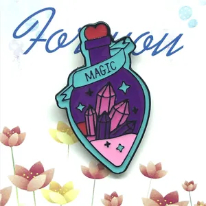 Magic potion bottle enamel pin with pink crystals and heart cap on a floral gift card