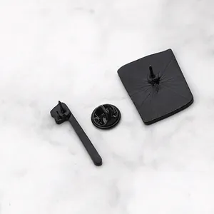 Black enamel brooch pins and butterfly clutches set for notebook and toothbrush designs