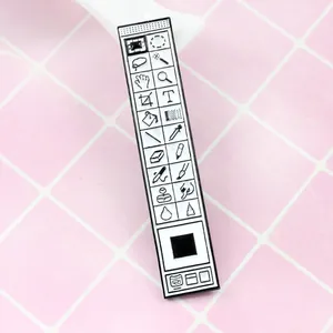 Creative Photoshop toolbar enamel pin with classic software UI icons on pink tile background