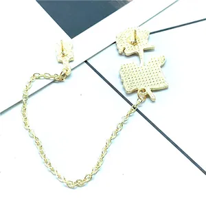 Dual-pin red rose chain brooch in gold finish for jackets and bags fashion accessories