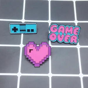 3-piece retro pixel game enamel pins set featuring gamepad, heart and Game Over
