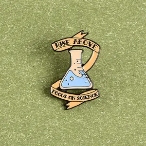 Detail of enamel pin featuring a blue flask and Rise Above Focus on Science text