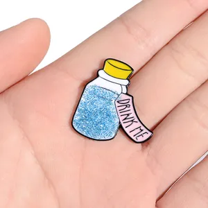 Sparkling Alice Drink Me potion bottle enamel brooch pin with blue glitter for backpacks