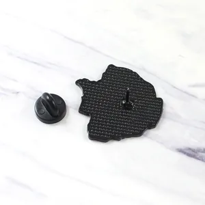 Back view of black enamel pin with anti-slip texture and rubber butterfly clutch