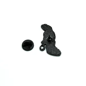 Black enamel brooch back view with anti-slip texture and rubber clutch attachment