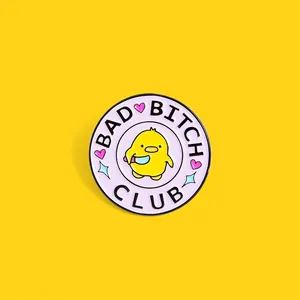 Macro detail of Bad Bitch Club enamel pin featuring a cartoon duck with a knife