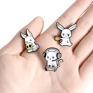 Cute enamel pin set featuring white rabbit with skull, coffee bunny, and gaming cat