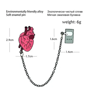 Creative anatomical heart and player chain brooch in pink enamel and eco-alloy