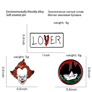 Set of horror clown alloy enamel pins including Pennywise head and red lover badge logo