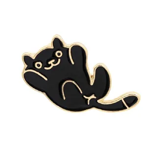 Macro detail of cute cartoon black cat enamel brooch with gold-plated alloy edges