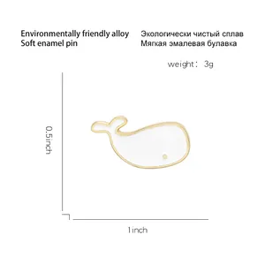 Cute white whale enamel brooch in eco-friendly alloy with gold edges and size details