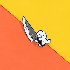 Close-up of funny white cartoon cat with knife enamel pin on vibrant orange background