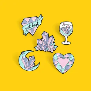 Five-piece pastel crystal enamel pin set with heart, diamond, moon, and floral designs